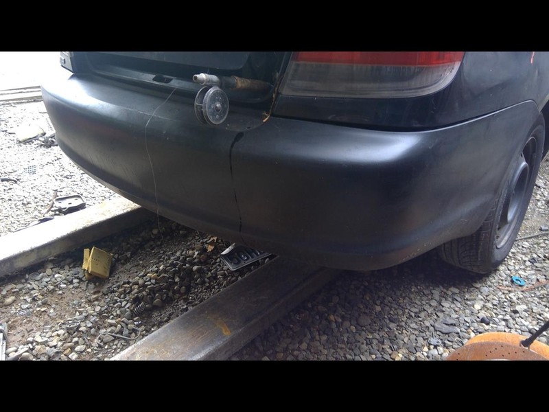 03 04 05 TOYOTA ECHO REAR BUMPER ASSEMBLY SCRATCHES BLK-209