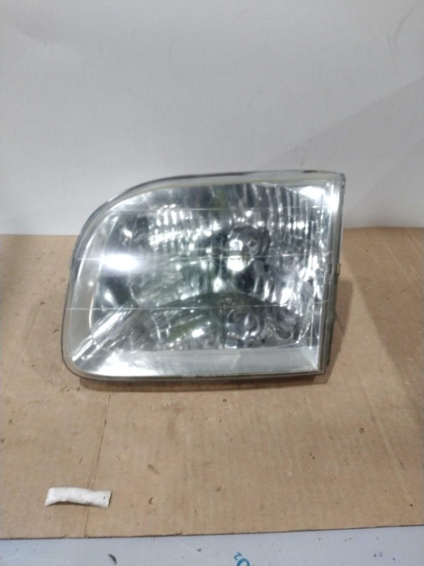 2001-2004 Toyota Sequoia Left Headlight Assembly Green OEM 649451 Used