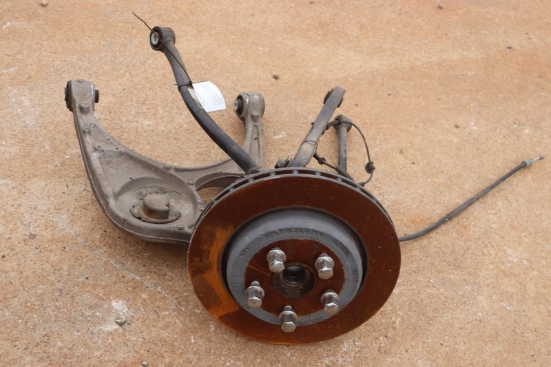 2018-2024 DODGE DURANGO AWD REAR LEFT SPINDLE KNUCKLE HUB W/ CONTROL ARMS OEM
