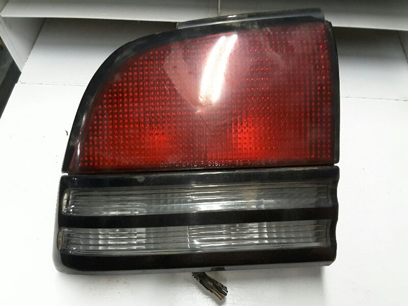 92 93 94 95 96 97 CUTLASS SUPREME L. TAIL LIGHT 4 DR 64134