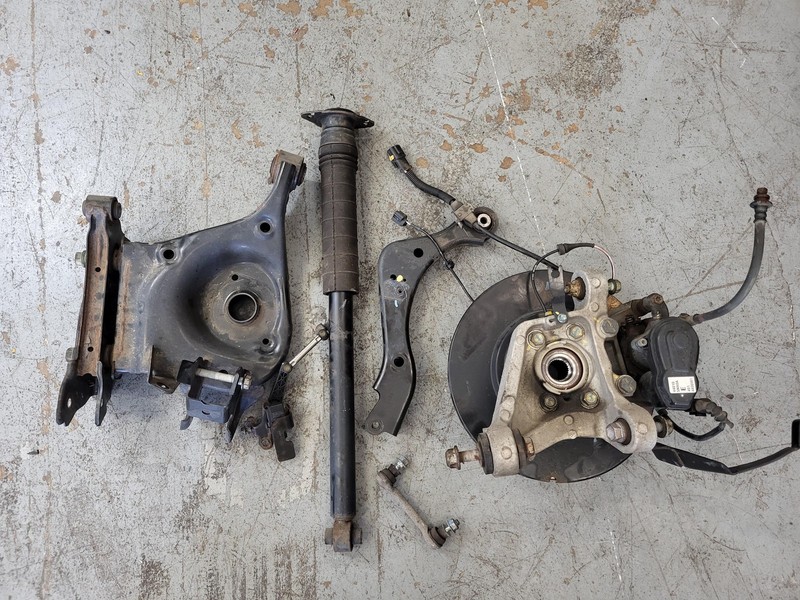 Used Oem Infiniti Left Driver Rear Suspension Knee for 2019-2020 QX50 2.0L AWD