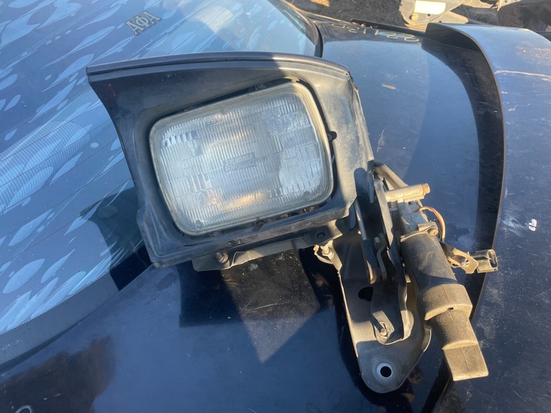90-93 TOYOTA CELICA OEM BLACK LH HEADLIGHT ASSEMBLY W/ MOTOR COVER & BEZEL