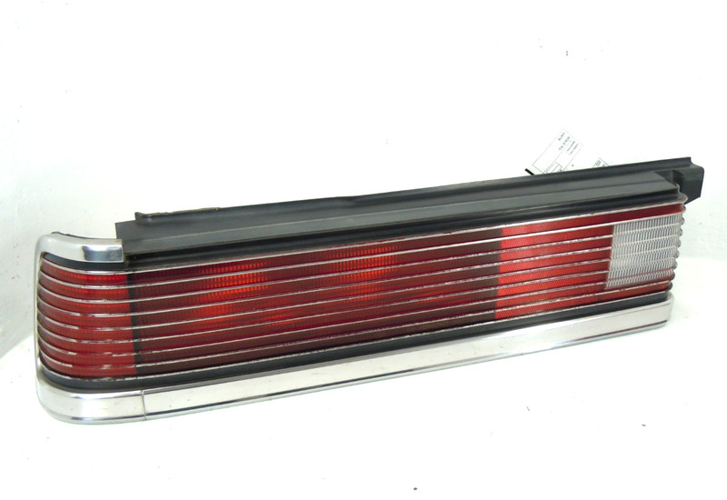 1986-1988 Chrysler Lebaron Sedan Tail Light Driver Left LH OEM