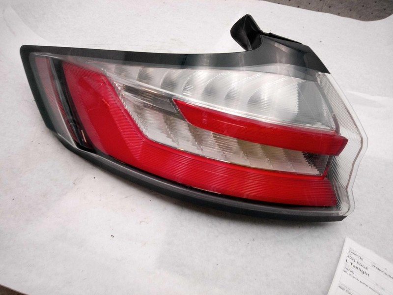 Used Left Tail Light Assembly fits: 2021 Ford Edge SEL quarter panel mounted L.