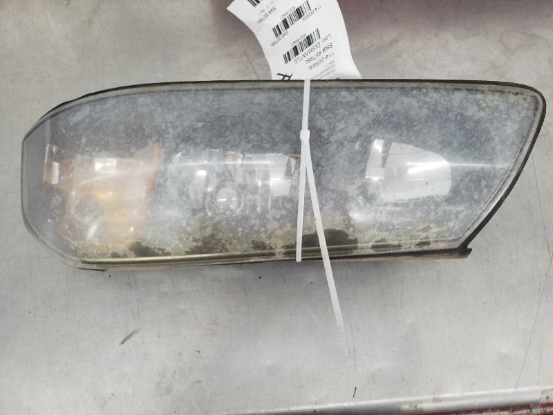 Driver Headlight Thru 2/5/04 Chrome Dome Over Bulb Fits 00-04 IMPALA 189421