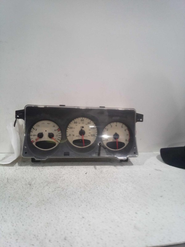 2003 Chrysler PT Cruiser Speedometer Gauge Cluster Maroon OEM Used 48K Miles