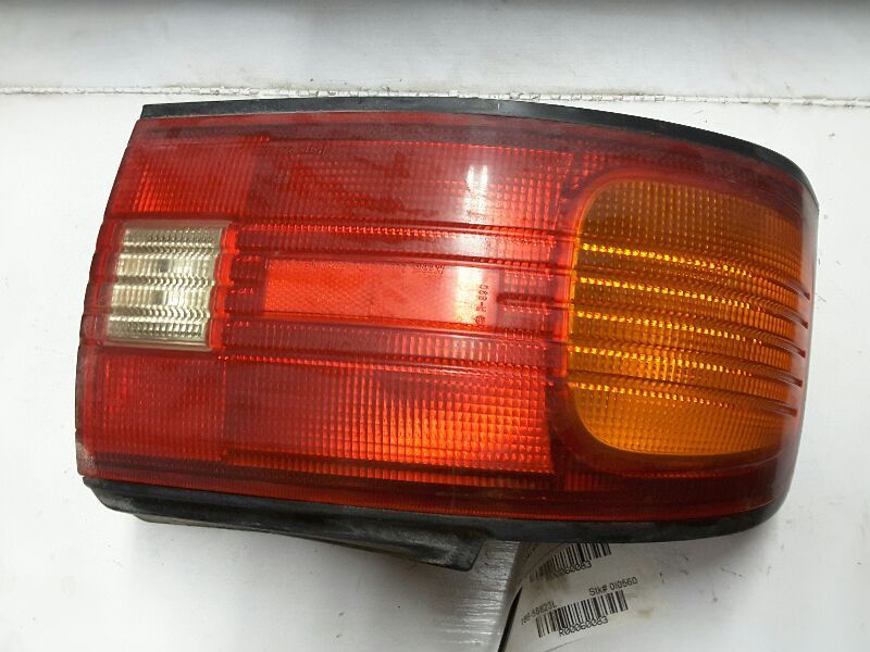 92 93 94 95 MAZDA PROTEGE L. TAIL LIGHT VIN JM1BG OUTER 60083