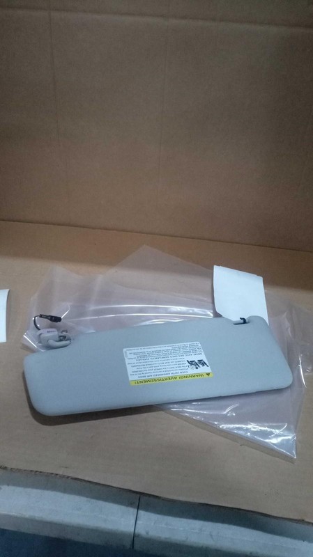 Used Left Sun Visor fits: 2017 Volkswagen Passat illuminated roof mounted L. w/g