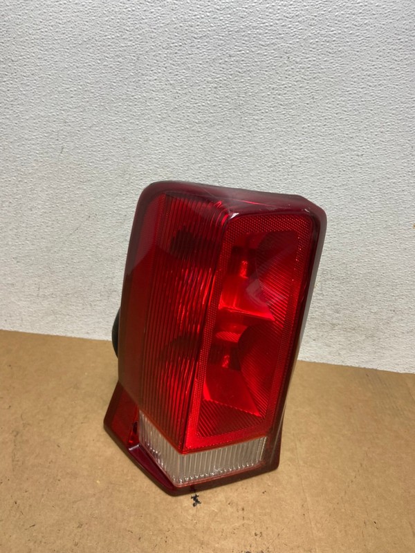 2002 to 2006 Cadillac Escalade Left Driver Side Tail Light OEM AE3209 LK