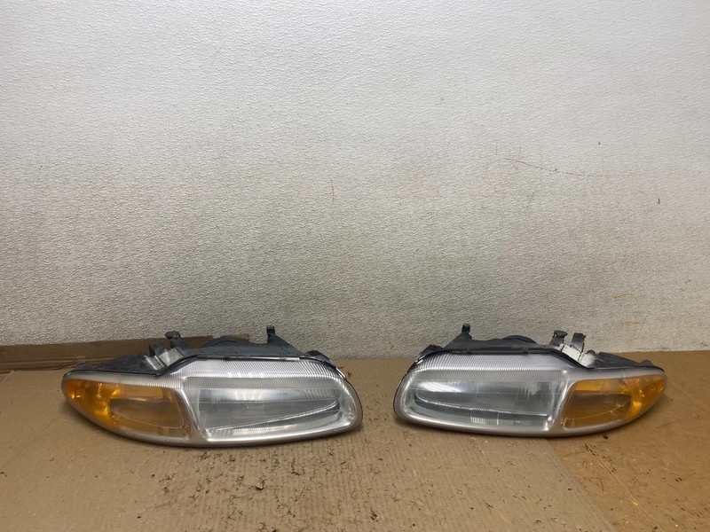 1996-2000 Chrysler Sebring Left+Right Side Halogen Headlights OEM U2411 DW