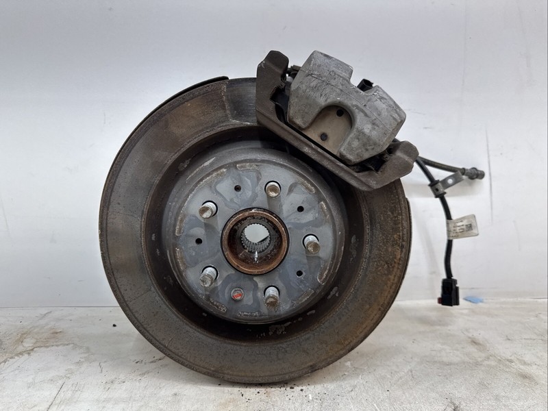π17-23 TESLA 3 AWD LEFT REAR SPINDLE KNUCKLE CALIPER1044411-00-F 15094 S14