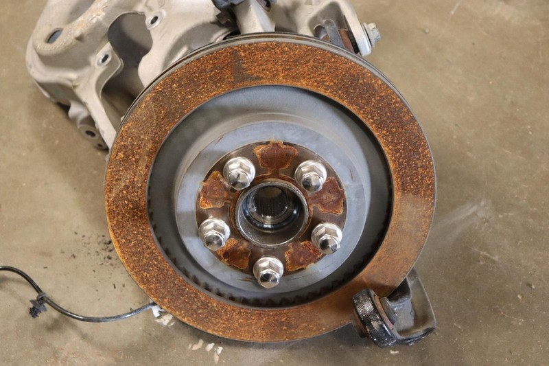 2015-2022 FORD MUSTANG GT REAR LEFT SPINDLE KNUCKLE HUB W/ CONTROL ARMS OEM