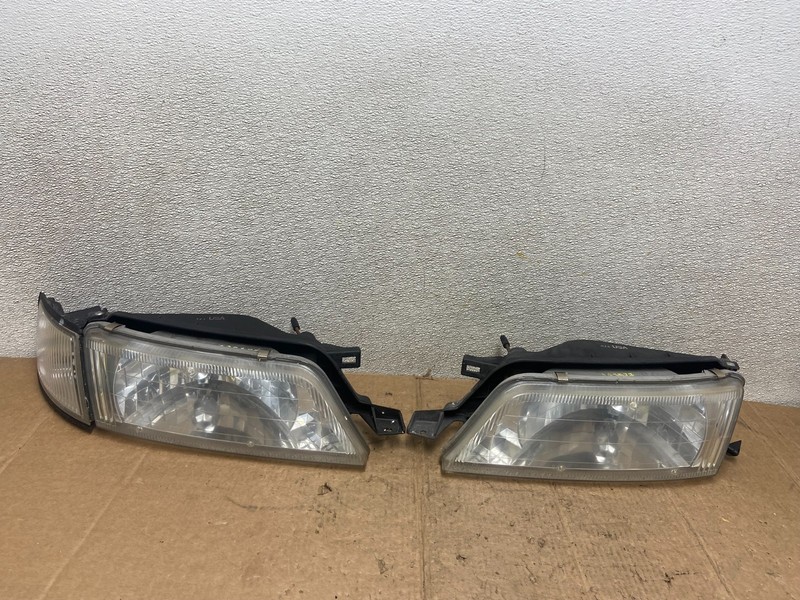 1997 to 1999 Nissan Maxima Left+Right Side Headlights Halogen OEM AA3577