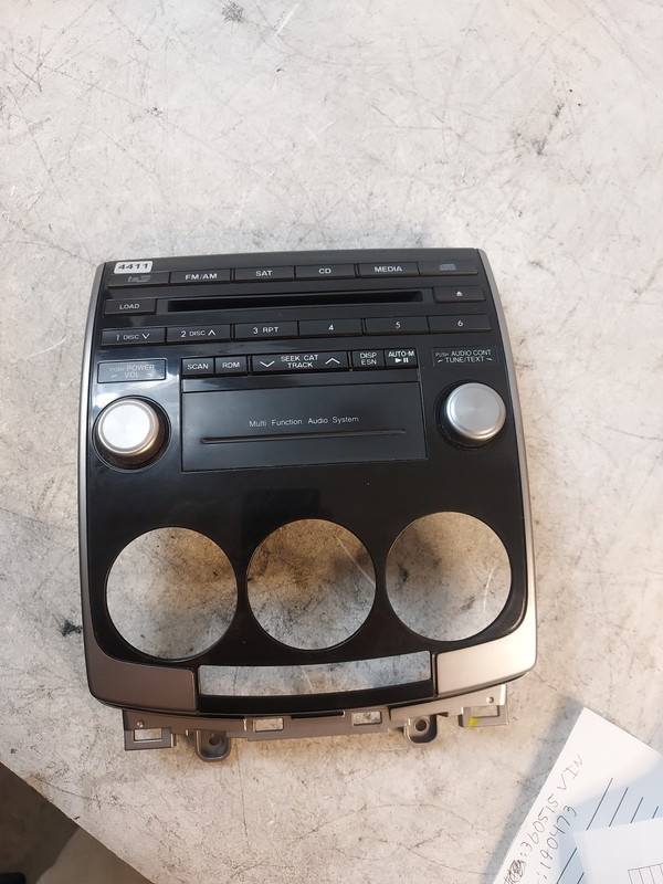 08-10 Mazda CD Player AMFM Radio Receiver Face Plate Control bezel black