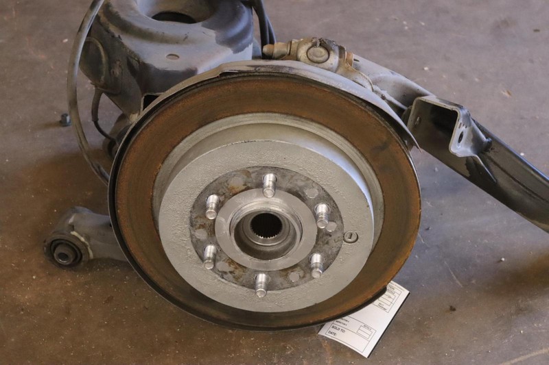 2011-2013 INFINITI QX56 2WD REAR LEFT SPINDLE KNUCKLE HUB W/ CONTROL ARMS OEM
