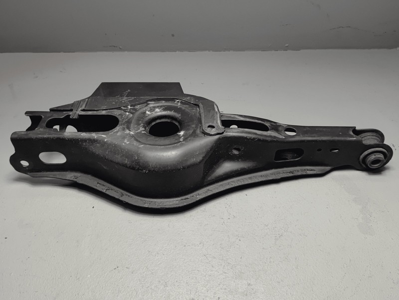 2019-2025 Toyota RAV4 Rear Driver Side Lower Rearward Control Arm w/Cover OEM