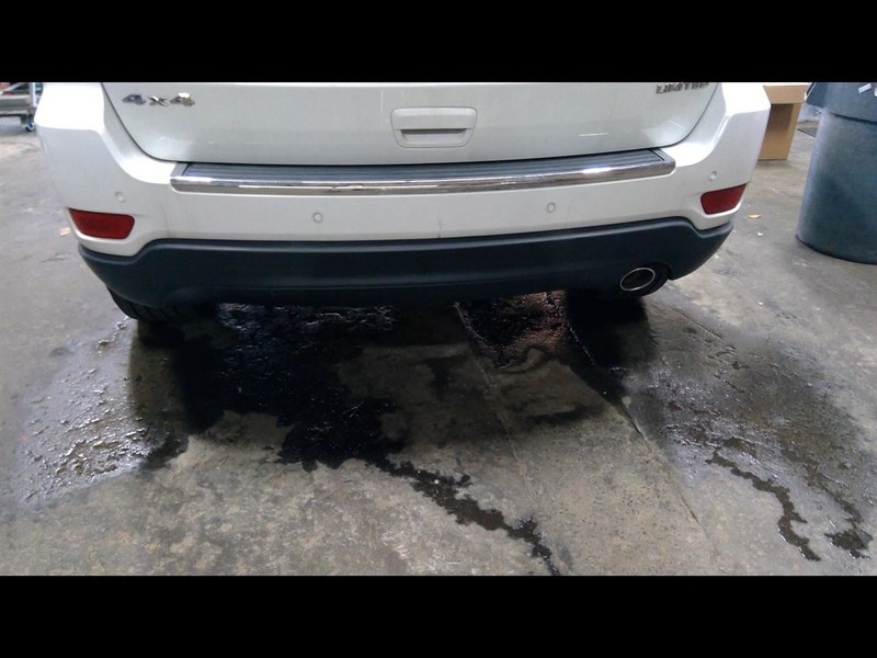 Rear Bumper Dual Exhaust With Park Assist Fits 11-13 GRAND CHEROKEE 1477157