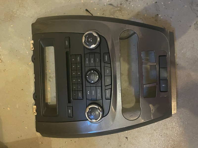 10-12 FORD FUSION RADIO CD PLAYER RADIO HEATER AC CONTROL DASH BEZEL