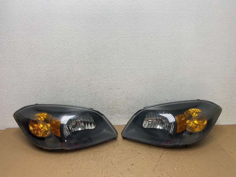 2005 - 2010 Chevrolet Cobalt Sedan Left+Right Set Headlights AD8035 DW