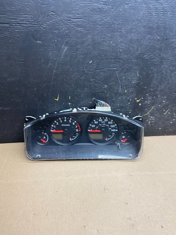 2005 Nissan Xterra Frontier Speedometer Cluster Gauge OEM t9215 DG