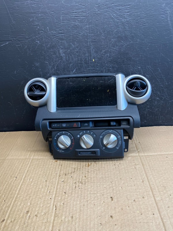 2004 to 2006 Scion XA Center Console Dash Radio Climate Control Bezel AC9488 DG