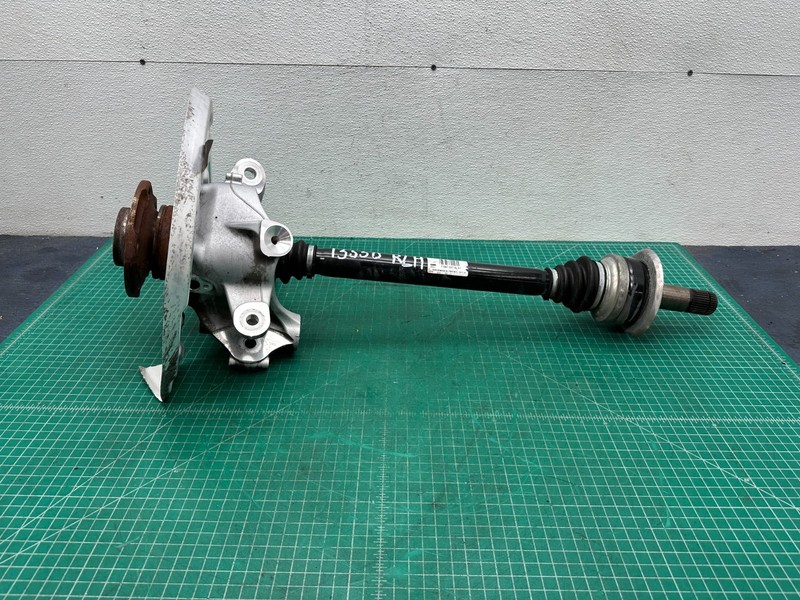 11-16 BMW 550i REAR LEFT SPINDLE KNUCKLE / HUB / AXLE SHAFT ASSEMBLY OEM