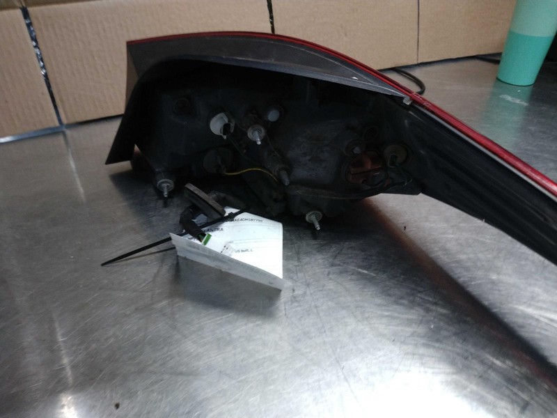 2013 Hyundai Elantra Left Tail Light Assembly - Silver, Minor Scrapes, Used
