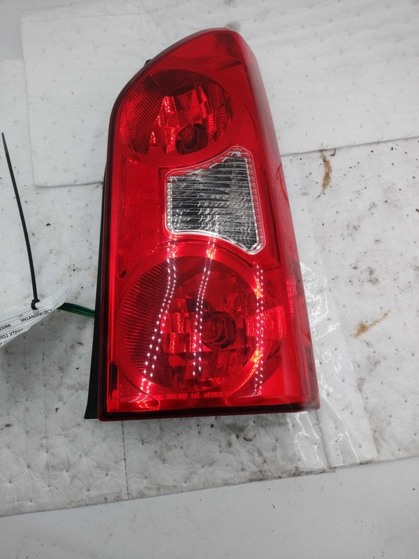 Used Right Tail Light Assembly fits: 2011 Nissan Xterra 4.0L quarter mounted Rig