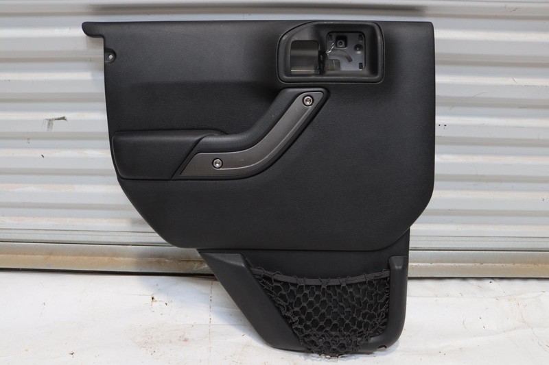 2011 JEEP WRANGLER REAR LEFT SIDE DOOR PANEL TRIM COVER BLACK OEM