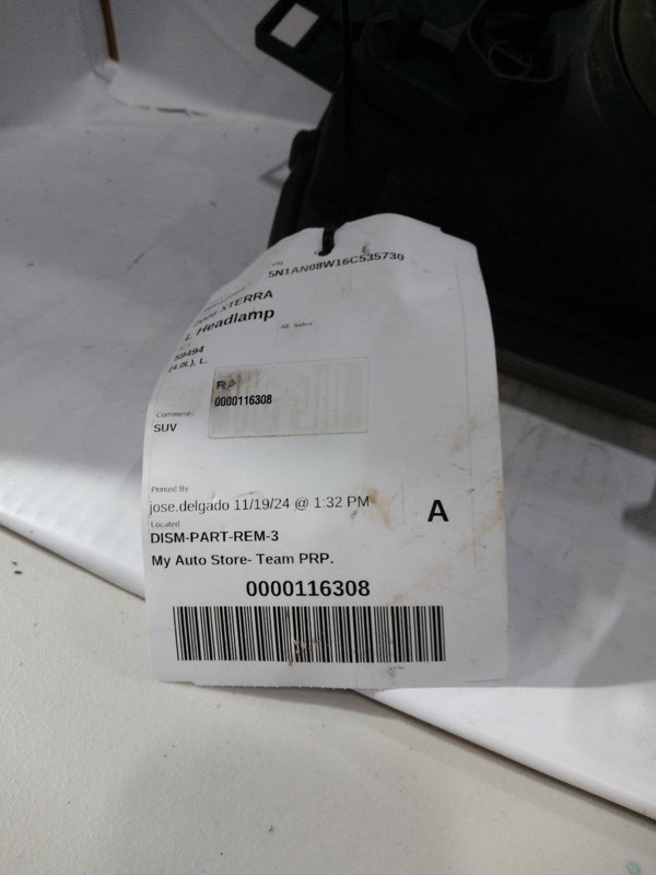 2006 Nissan Xterra Left Headlight Assembly Black OEM 529030 Used 147K Miles