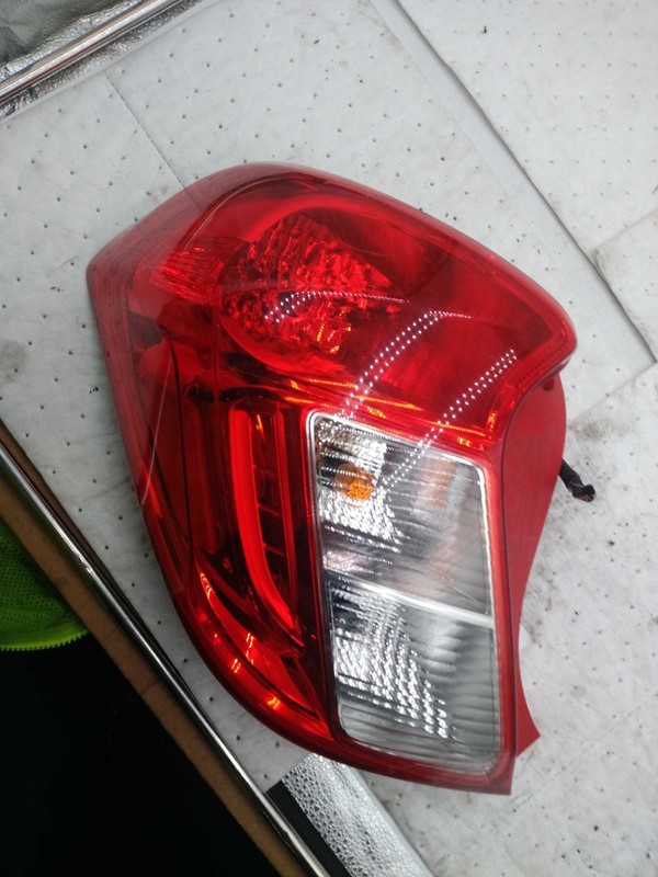 2016 Chevrolet Spark Left Tail Light Assembly Purple 619474 Used 114K Miles