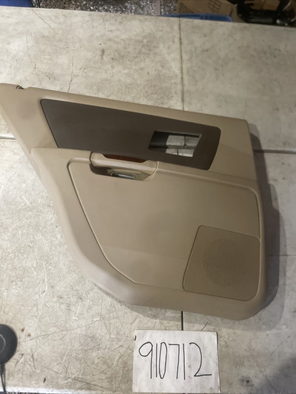 2004-2009 CADILLAC SRX REAR LEFT DOOR TRIM PANEL