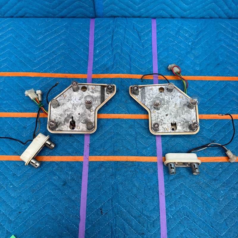 87–91 Volvo 780 Bertone Rear Tail Light Bulb Holders Left and Right OEM Carello