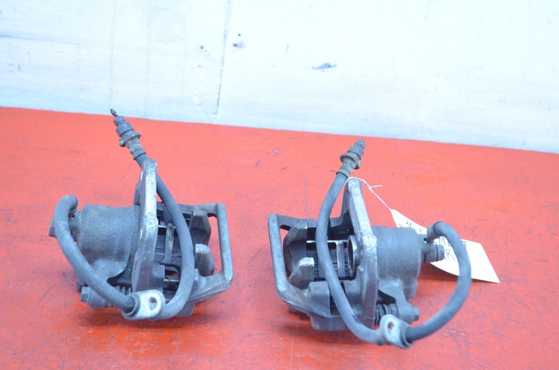 03-11 HONDA ELEMENT FWD REAR LEFT / RIGHT BRAKE CALIPER SET OEM