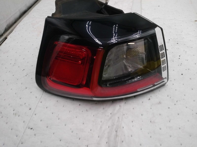 Used Left Tail Light Assembly fits: 2019 Jeep Cherokee bumper mounted rear fog L