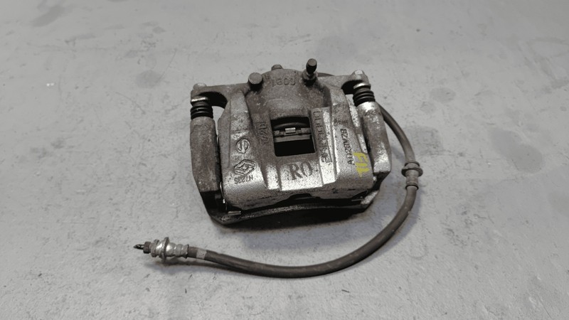 2021 - 2023 NISSAN ROGUE FRONT DRIVER SIDE DISC BRAKE CALIPER OEM