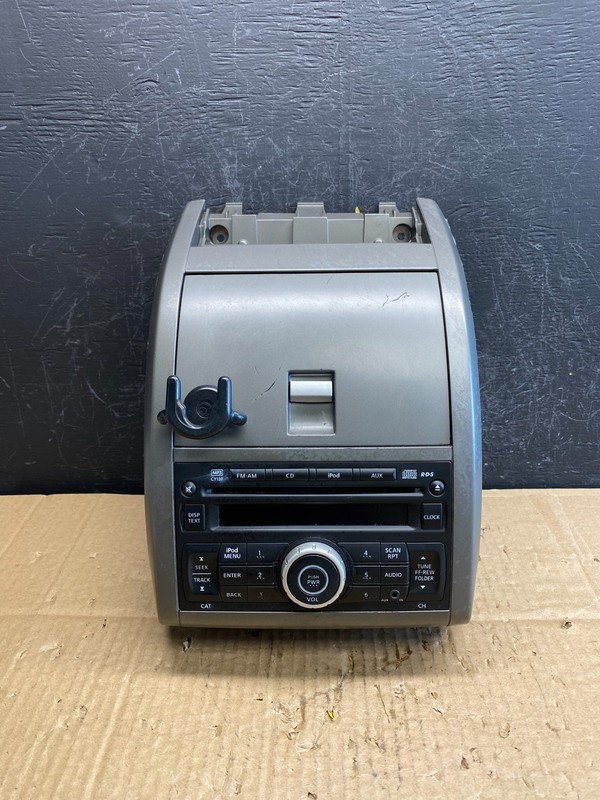 2010-2012 Nissan Sentra Center Dash Radio Bezel Panel Cubby Storage AC9610 DG