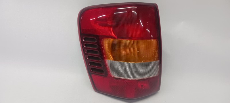 03-'04 JEEP GRAND CHEROKEE Left driver Taillight OEM Grade A!