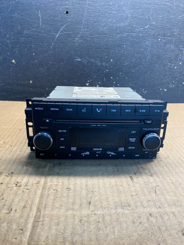 2007-2012 Chrysler Dodge Jeep Ram Radio CD MP3 AUX Receiver AA7811 DG