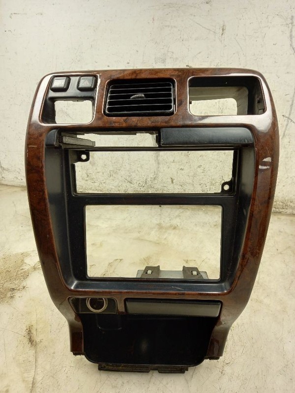 98 TOYOTA 4 RUNNER RADIO BEZEL WOODGRAIN CLOCK
