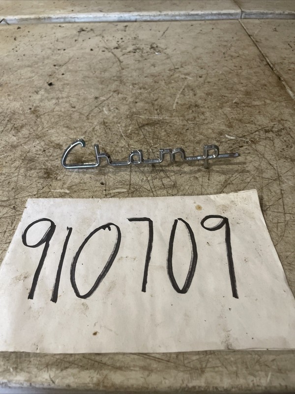 1960–64 Studebaker Champ Driver Door Emblem OEMScript Badge( 1broken Tab)