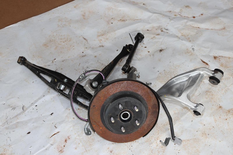 2020-2023 SUBARU LEGACY AWD REAR LEFT SPINDLE KNUCKLE HUB W/ CONTROL ARMS OEM