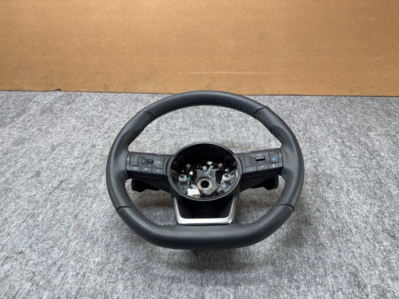 NISSAN PATHFINDER 2022-2025 OEM LEFT WHEEL WITH PADDLE SHIFTERS & SWITCHES BLACK