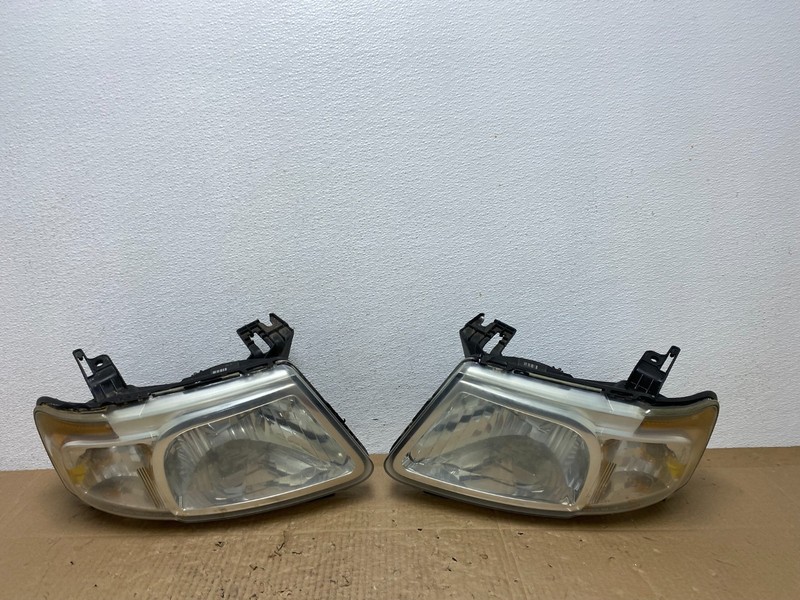 2008 to 2011 Mazda Tribute Left+Right Headlights Oem AC4005 DW