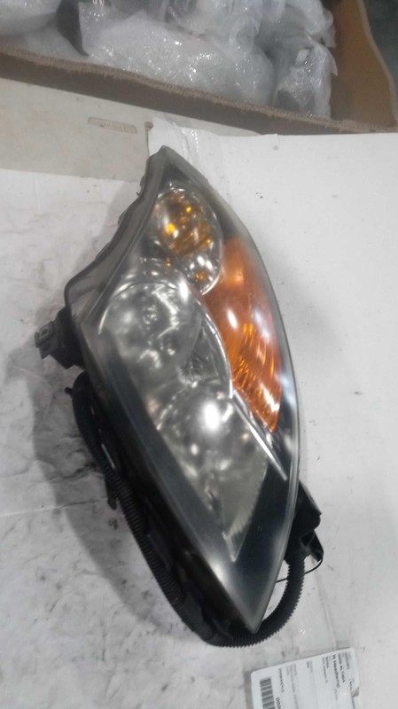 Used Right Headlight Assembly fits: 2009 Nissan Altima Sdn halogen Right Grade C