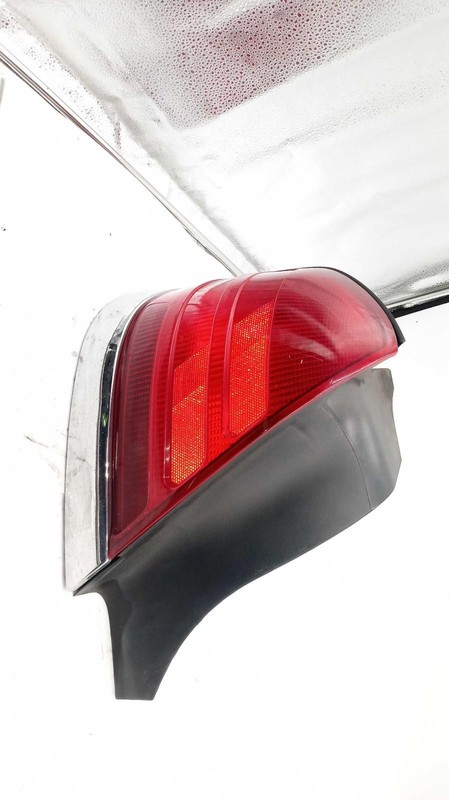Used Left Lower Tail Light Assembly fits: 2005 Ford Crown victoria quarter panel