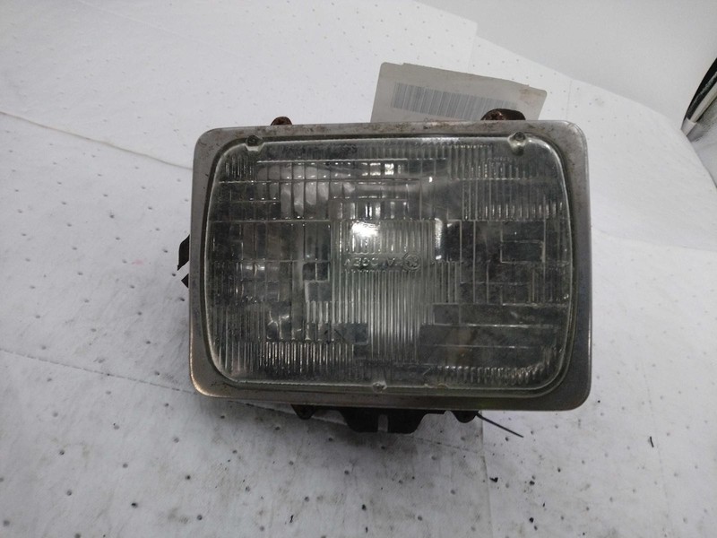 Used Right Headlight Assembly fits: 2014 Ford E250 VAN sealed beam Right Grade C