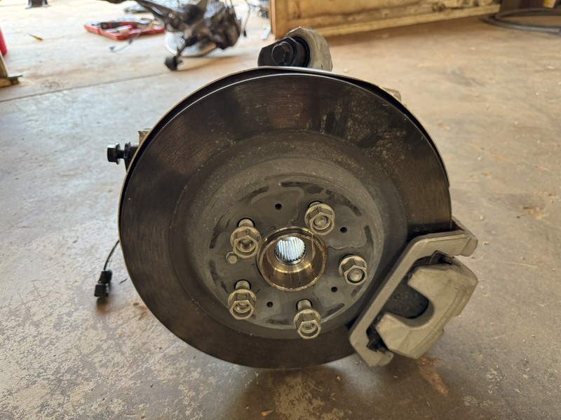 2017-2020 TESLA MODEL 3 REAR RIGHT SPINDLE KNUCKLE HUB CALIPER SHIELD 149 S23