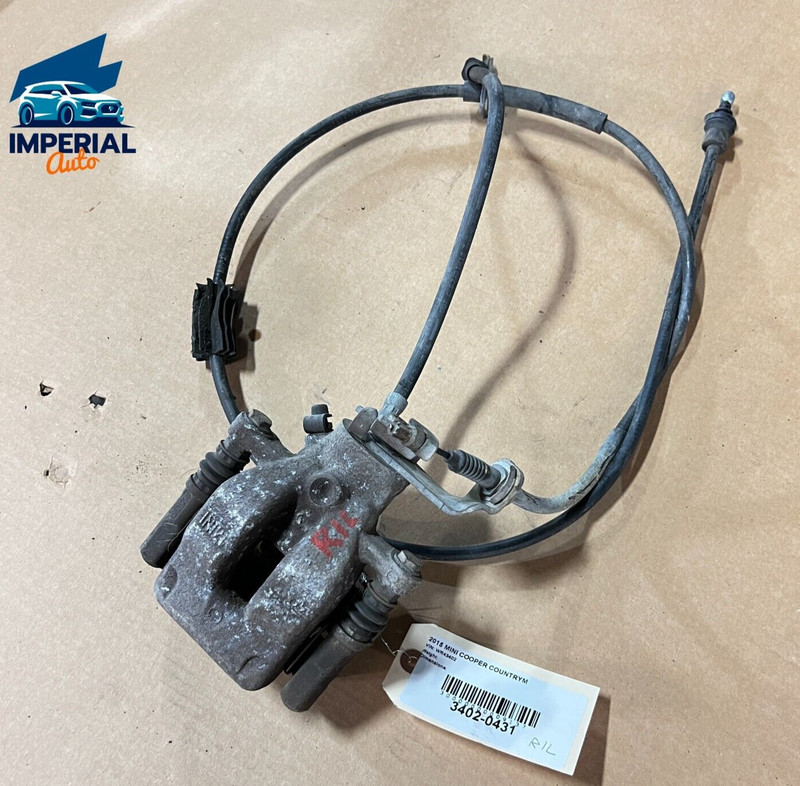 2011-2016 MINI COOPER COUNTRYMAN REAR LEFT SIDE BRAKE CALIPER W/ PAD OEM TRW