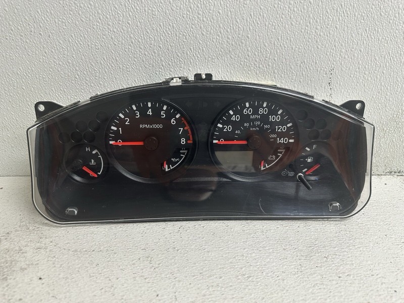 2008-2009 Nissan Frontier 2.5L Auto Cluster Speedometer tach gauges panel 186k
